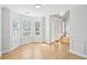 Sunlit living room with large windows and traditional trim at 1650 Willow River Run, Grayson, GA 30017