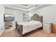 Cozy bedroom with a TV, bed, and a large window offering natural light at 3861 Sunbridge Dr, Snellville, GA 30039