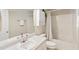 A well lit bathroom featuring a vanity with a mirror, toilet, and bathtub with shower at 507 Oakleaf Ct, Acworth, GA 30102