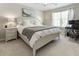 This is a bedroom with a work desk area, soft carpet, and big windows that let in the light at 507 Oakleaf Ct, Acworth, GA 30102