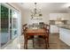 Dining area with sliding glass door to backyard and backyard access at 507 Oakleaf Ct, Acworth, GA 30102