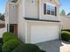 Charming two-story home with attached two-car garage and well-maintained landscaping at 507 Oakleaf Ct, Acworth, GA 30102
