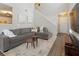 Open living room with high ceilings, staircase, and modern furnishings at 507 Oakleaf Ct, Acworth, GA 30102