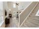 Inviting living room featuring a cozy fireplace and open staircase at 507 Oakleaf Ct, Acworth, GA 30102