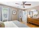 Sun-filled bedroom with hardwood floors and closet with nearby furnishings at 777 Antone Nw St, Atlanta, GA 30318