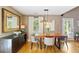 Inviting dining room features wood table, stylish chairs and natural light at 777 Antone Nw St, Atlanta, GA 30318