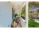 Cozy front porch with a swing, charming decor, and a view of the landscaped yard at 777 Antone Nw St, Atlanta, GA 30318