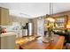 Functional kitchen area with modern appliances, ample counter space, and a dining area with a wooden table at 777 Antone Nw St, Atlanta, GA 30318