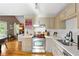 Bright kitchen features stainless steel appliances, light countertops, and updated cabinets at 777 Antone Nw St, Atlanta, GA 30318