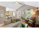Bright living room with vaulted ceiling, hardwood floors, comfortable seating, and natural light at 777 Antone Nw St, Atlanta, GA 30318