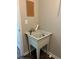 Practical utility sink with wall-mounted faucet, perfect for household tasks at 220 Rehobeth Way, Fayetteville, GA 30214