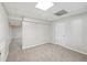 Finished basement with carpet flooring and paneled walls at 278 Benjamin Dr, Rockmart, GA 30153