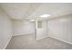 Finished basement space featuring neutral carpet and paneled walls at 278 Benjamin Dr, Rockmart, GA 30153