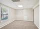 Finished basement with carpet flooring and natural light from a window at 278 Benjamin Dr, Rockmart, GA 30153