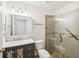 Bathroom featuring a glass shower, tile accents, modern vanity, and updated fixtures at 278 Benjamin Dr, Rockmart, GA 30153