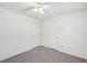 Bedroom with two doors, carpet flooring, white walls and trim, and a ceiling fan at 278 Benjamin Dr, Rockmart, GA 30153