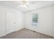 Bedroom with a large window, carpet flooring, white walls and trim, and a ceiling fan at 278 Benjamin Dr, Rockmart, GA 30153