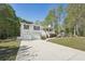 Charming split-level home with two-car garage, front porch, and landscaped yard at 278 Benjamin Dr, Rockmart, GA 30153