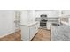 Modern kitchen featuring granite countertops, stainless steel appliances, and white cabinetry at 278 Benjamin Dr, Rockmart, GA 30153