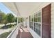 View from porch with white railings and brown flooring, overlooking the front yard at 278 Benjamin Dr, Rockmart, GA 30153