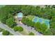 Aerial view of the community pool, tennis courts, clubhouse, and parking at 3531 Vintage Trl, Woodstock, GA 30189