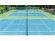Close up on the community tennis courts with nets and benches at 3531 Vintage Trl, Woodstock, GA 30189