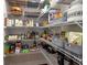 Walk-in pantry with wire shelving stocked with food, spices, and other kitchen essentials at 3825 Raeburn Rd, Cumming, GA 30028