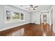 Sunlit bedroom featuring hardwood floors and a bay window at 4220 Smith Rd, Loganville, GA 30052