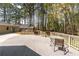 Inviting gray deck with decorative railings, perfect for entertaining and outdoor enjoyment at 4220 Smith Rd, Loganville, GA 30052