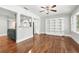 Open-concept living area featuring a bright, open view into the kitchen at 4220 Smith Rd, Loganville, GA 30052