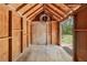 Interior view of storage shed with wood walls, ceiling and floor at 4220 Smith Rd, Loganville, GA 30052