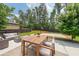 Spacious backyard featuring a patio area, basketball court, and well-maintained lawn at 5617 Casa Blanca Ln, Atlanta, GA 30331