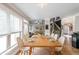 Bright dining area with many windows, wood floors and views to staircase and living areas at 5617 Casa Blanca Ln, Atlanta, GA 30331