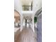 Inviting entrance hall with soaring ceilings, arched doorways, wood floors and second story landing at 5617 Casa Blanca Ln, Atlanta, GA 30331