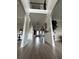 Inviting foyer with hardwood floors, decorative molding, and views into the living spaces at 5617 Casa Blanca Ln, Atlanta, GA 30331