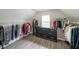 Spacious walk-in closet offering ample storage with clothing racks, shelving, and drawers at 5617 Casa Blanca Ln, Atlanta, GA 30331