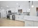 Modern kitchen with stainless steel appliances and marble countertops at 1830 Mayfield Rd, Alpharetta, GA 30009