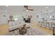 Spacious living room featuring an open floor plan, modern decor, and ample natural light at 1830 Mayfield Rd, Alpharetta, GA 30009