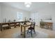 Home office with a desk, shelves, and a window, offering a workspace at 1830 Mayfield Rd, Alpharetta, GA 30009