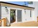 Wooden back deck near a door and windows with a view of the inside at 4544 Savage Ne Dr, Marietta, GA 30066