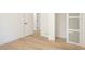 Bright bedroom with light hardwood floors and minimalist design at 4544 Savage Ne Dr, Marietta, GA 30066