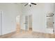 Bright bedroom with high ceilings, wood floors, and multiple doorways leading to other rooms at 4544 Savage Ne Dr, Marietta, GA 30066