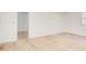 The bedroom has white walls, white trim and LVP flooring throughout at 4544 Savage Ne Dr, Marietta, GA 30066