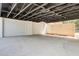 Spacious three-car garage with white doors and an exposed ceiling at 4544 Savage Ne Dr, Marietta, GA 30066