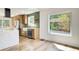 Well-lit kitchen with stainless steel appliances, stylish cabinetry, and a view of the outdoors at 4544 Savage Ne Dr, Marietta, GA 30066