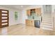 Open living space with built-in bar area, custom cabinets, and convenient wine storage at 4544 Savage Ne Dr, Marietta, GA 30066