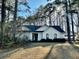 A charming single-story home with a well-manicured lawn and mature trees at 9921 Al Cooper Trce, Jonesboro, GA 30238