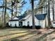 Charming one-story home features arched windows and a side entry garage at 9921 Al Cooper Trce, Jonesboro, GA 30238