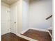 Entry way/hallway with hardwood floors, white trim and doors at 1026 Township Sq, Alpharetta, GA 30022