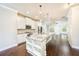 Modern kitchen featuring granite countertops, stainless steel appliances, and a large kitchen island at 1026 Township Sq, Alpharetta, GA 30022